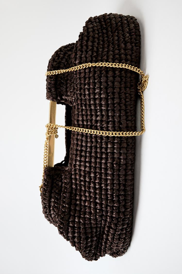 BOLSA CLUTCH COM CORPO TRANÇADO