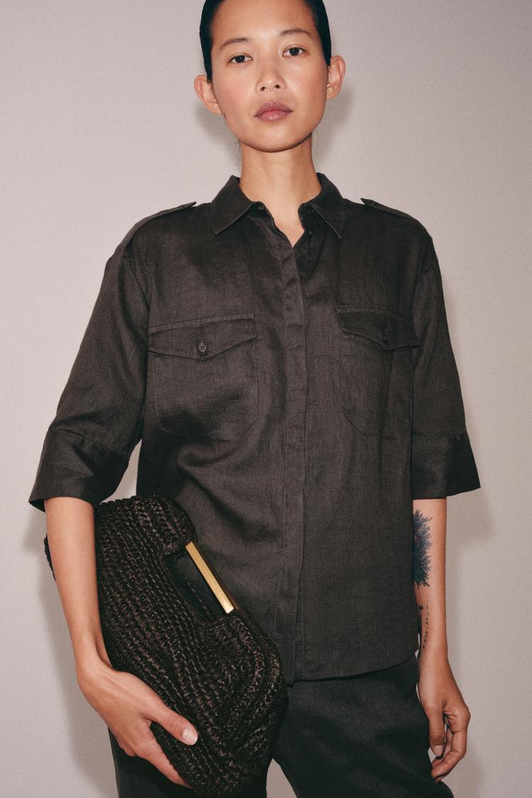 BOLSA CLUTCH COM CORPO TRANÇADO